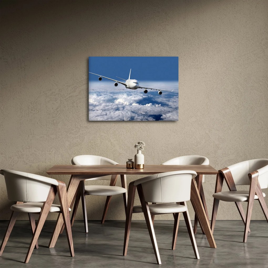 Obraz - Samolot w chmurach (70x50 cm)