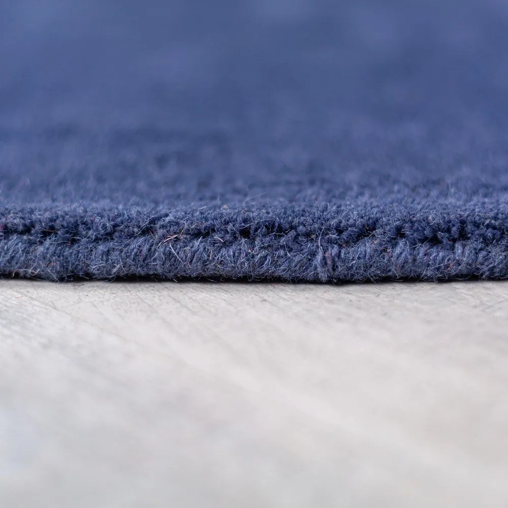 Niebieski wełniany okrągły dywan tkany ręcznie ø 150 cm Mia Segment – Flair Rugs