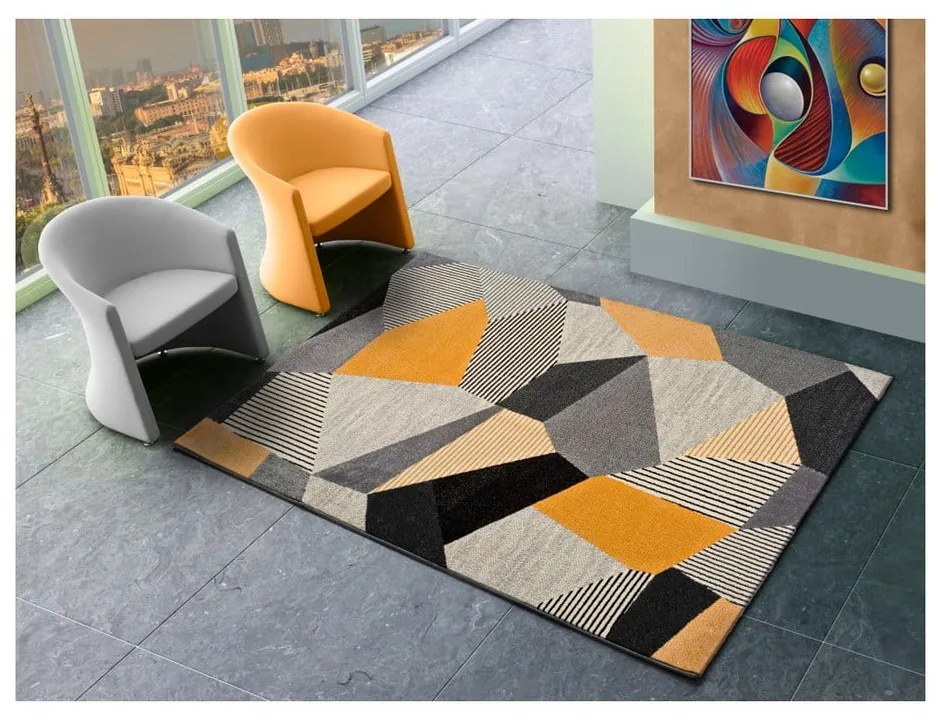 Pomarańczowo-szary dywan Universal Gladys Sarro, 140x200 cm