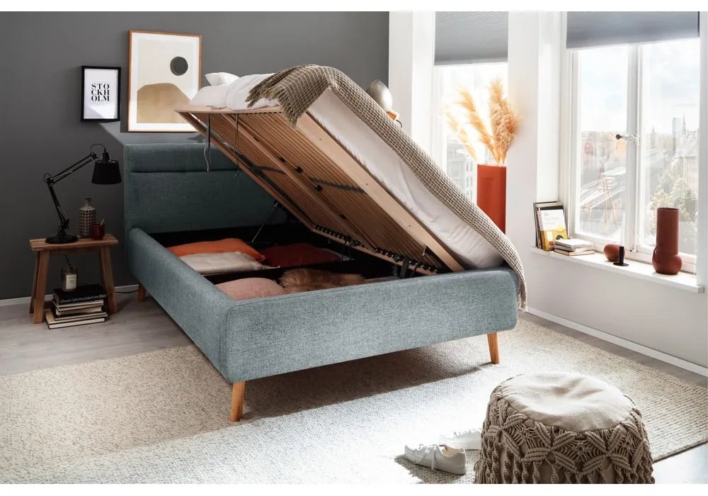 Szaroniebieskie tapicerowane łóżko dwuosobowe ze schowkiem ze stelażem 140x200 cm Lotte – Meise Möbel