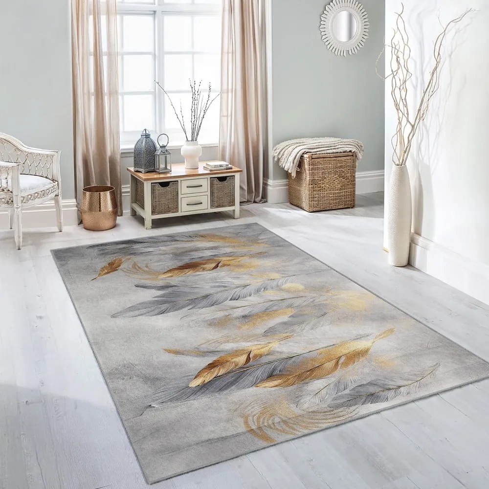 Dywan w szaro-złotym kolorze odpowiedni do prania 120x180 cm Golden Feathers – Mila Home