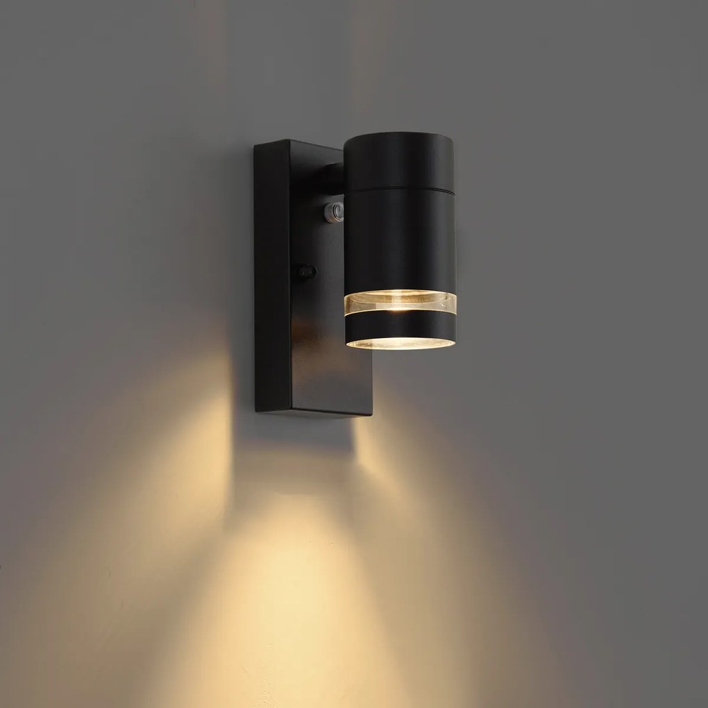 Nowoczesna lampa ścienna zewnętrzna czarna IP44 z czujnikiem zmierzchu - Ensam