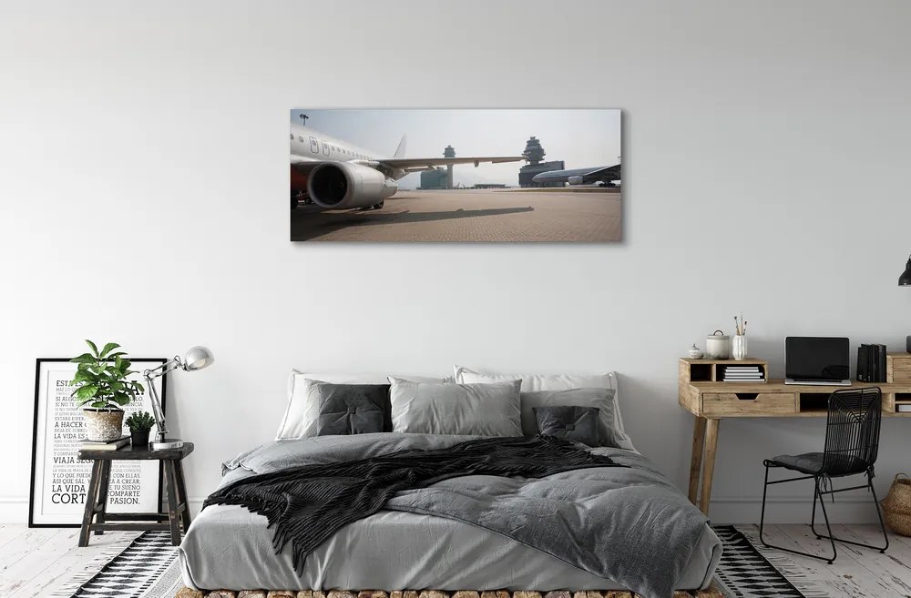 Obraz na płótnie Samolot na Tle Lotniska