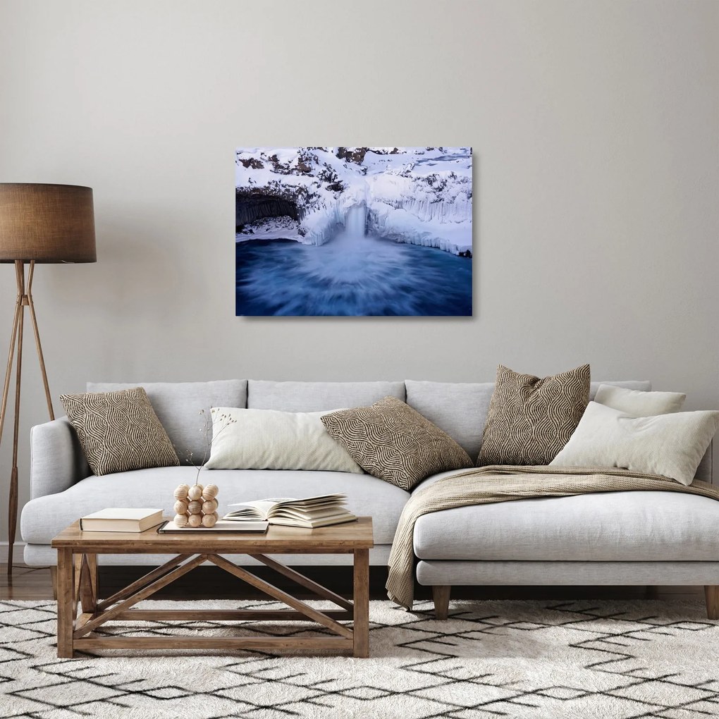 Obraz na szkle wodospadu zimą (70x50 cm)