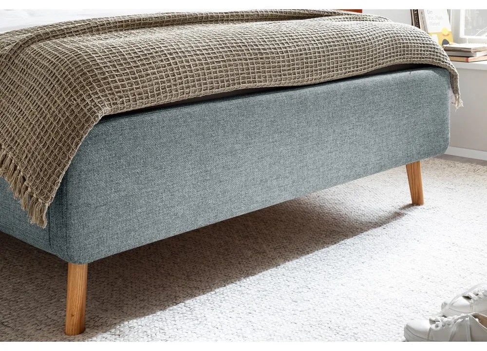 Szaroniebieskie tapicerowane łóżko dwuosobowe ze schowkiem ze stelażem 140x200 cm Lotte – Meise Möbel