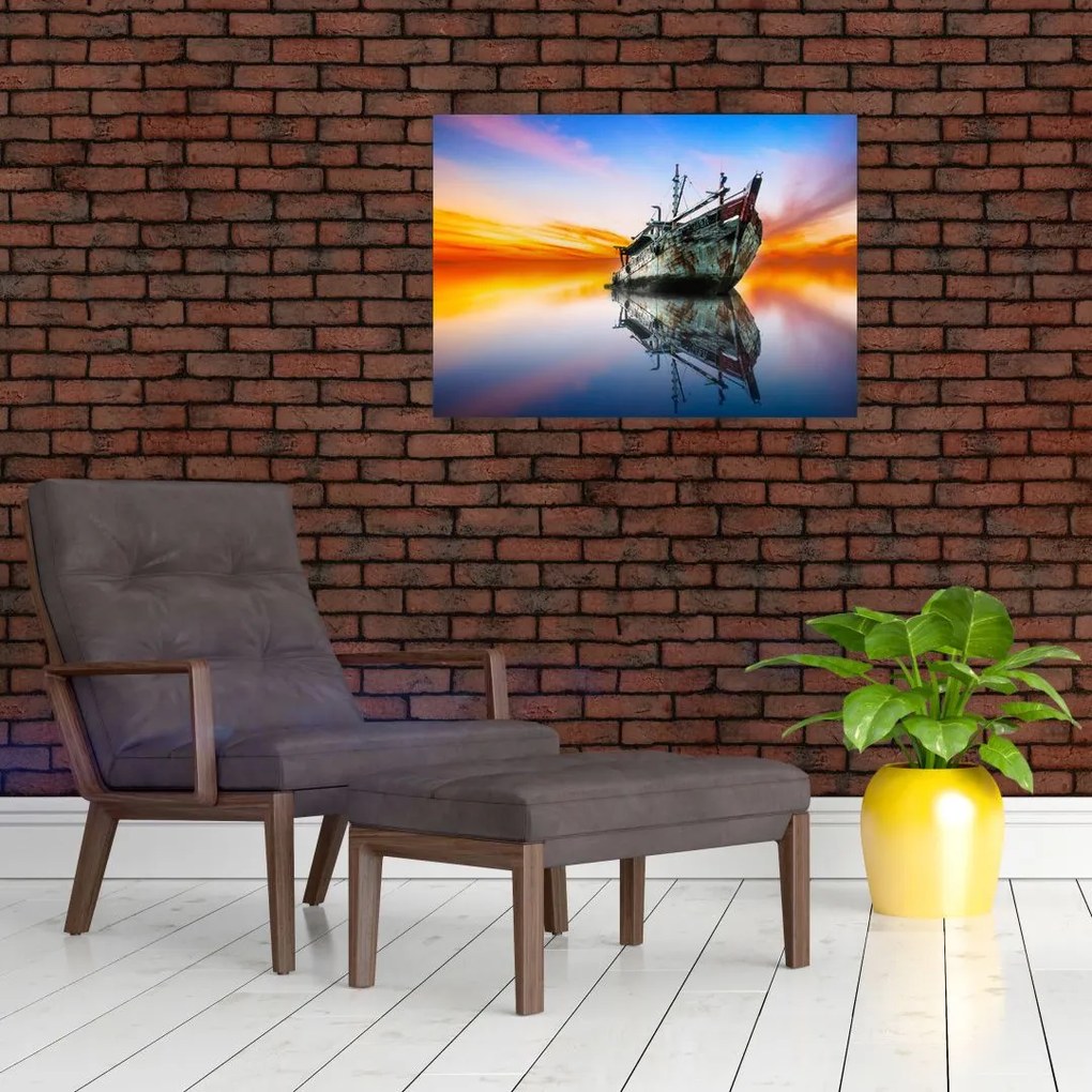 Obraz - Wschód słońca nad wrakiem łodzi (70x50 cm)