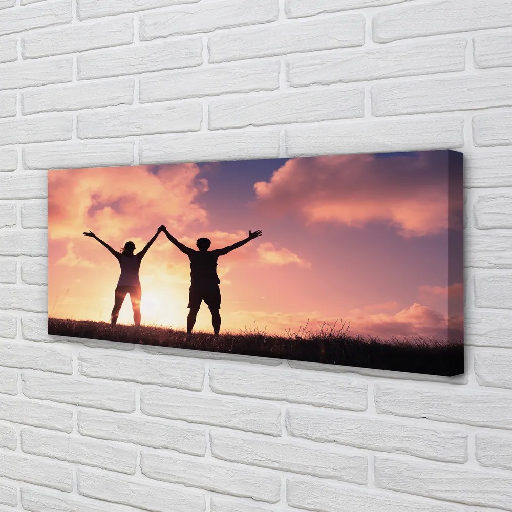 Fotoobraz na płótnie Ludzie o Zachodzie Słońca
