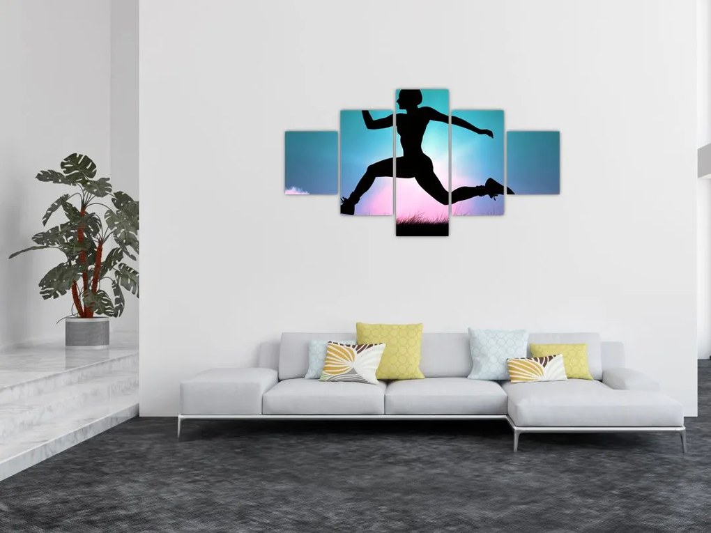 Obraz skaczącej sylwetki kobiety (125x70 cm)