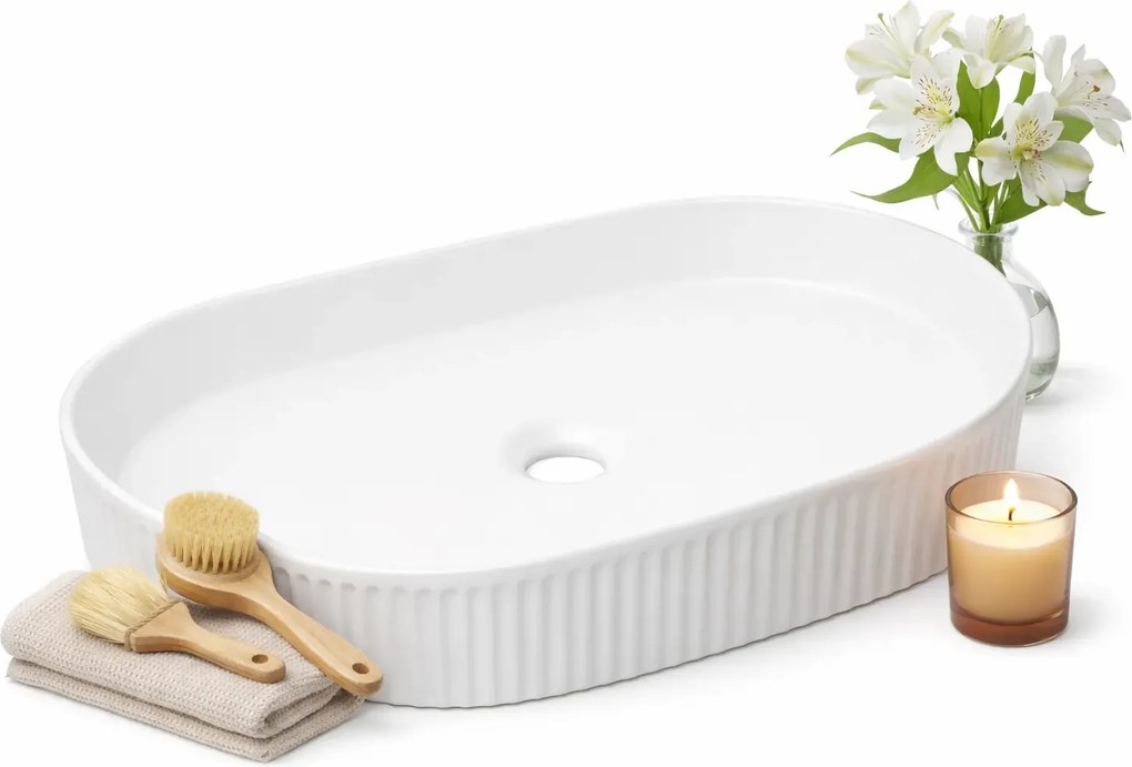 Biała owalna ceramiczna umywalka F8-C77