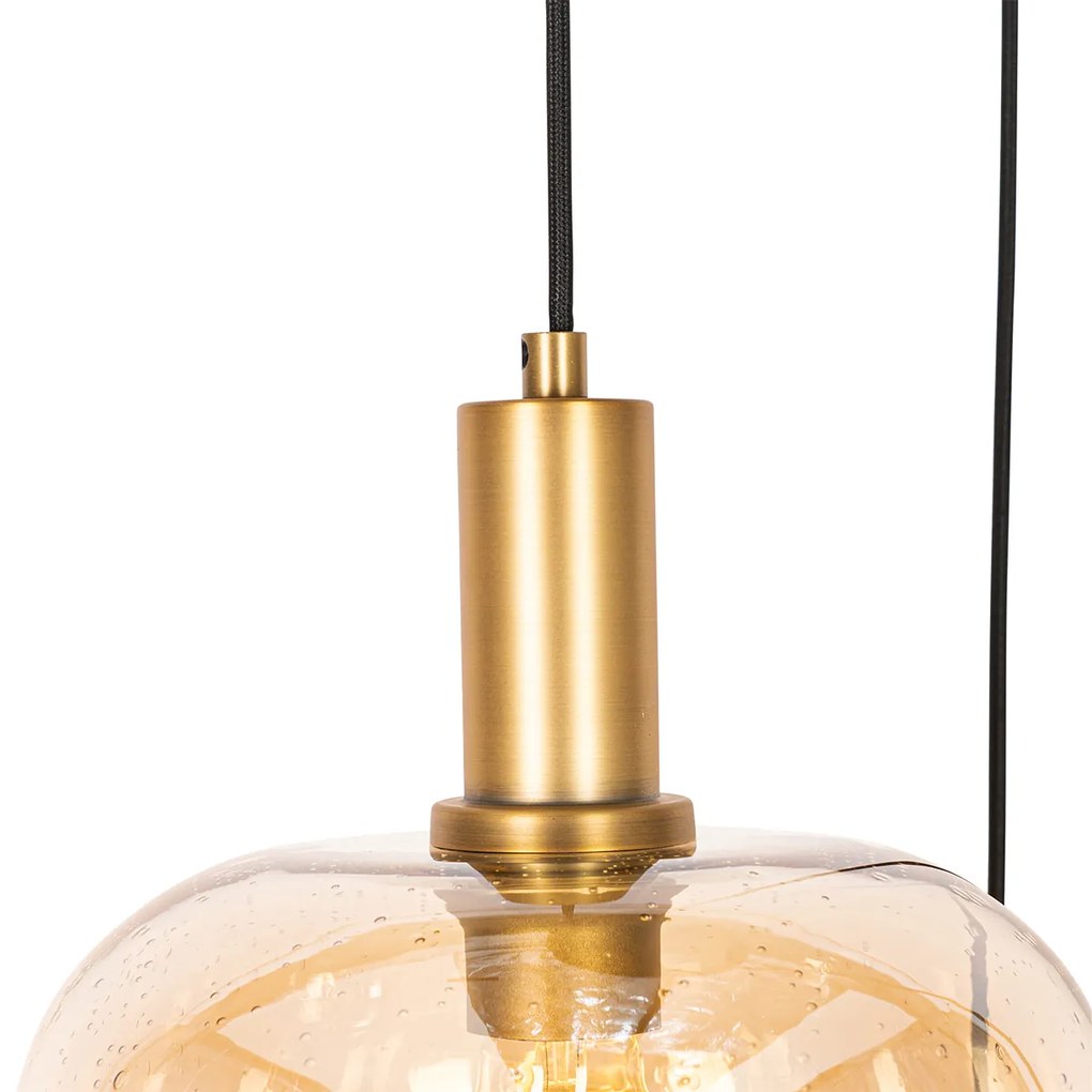 Designerska lampa wisząca czarna z mosiądzem i bursztynowym szkłem 3-światłowa - ZuzannaDesignerski Oswietlenie wewnetrzne