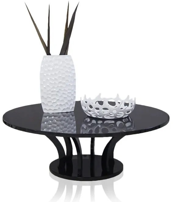 Czarny, okrągły stolik, wysoki połysk, styl modernistyczny.