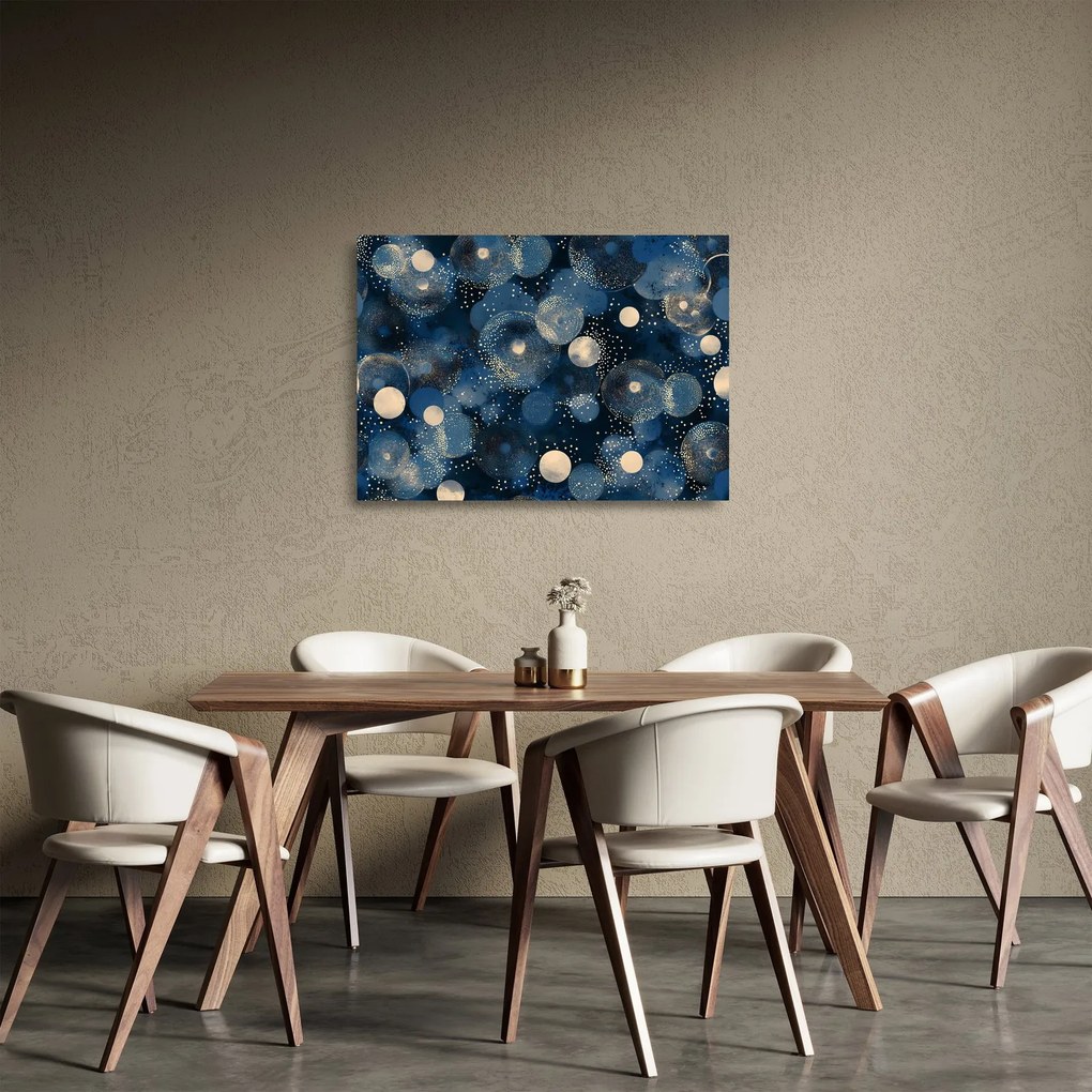 Obraz na szkle - Niebiesko-złote pierścienie (70x50 cm)