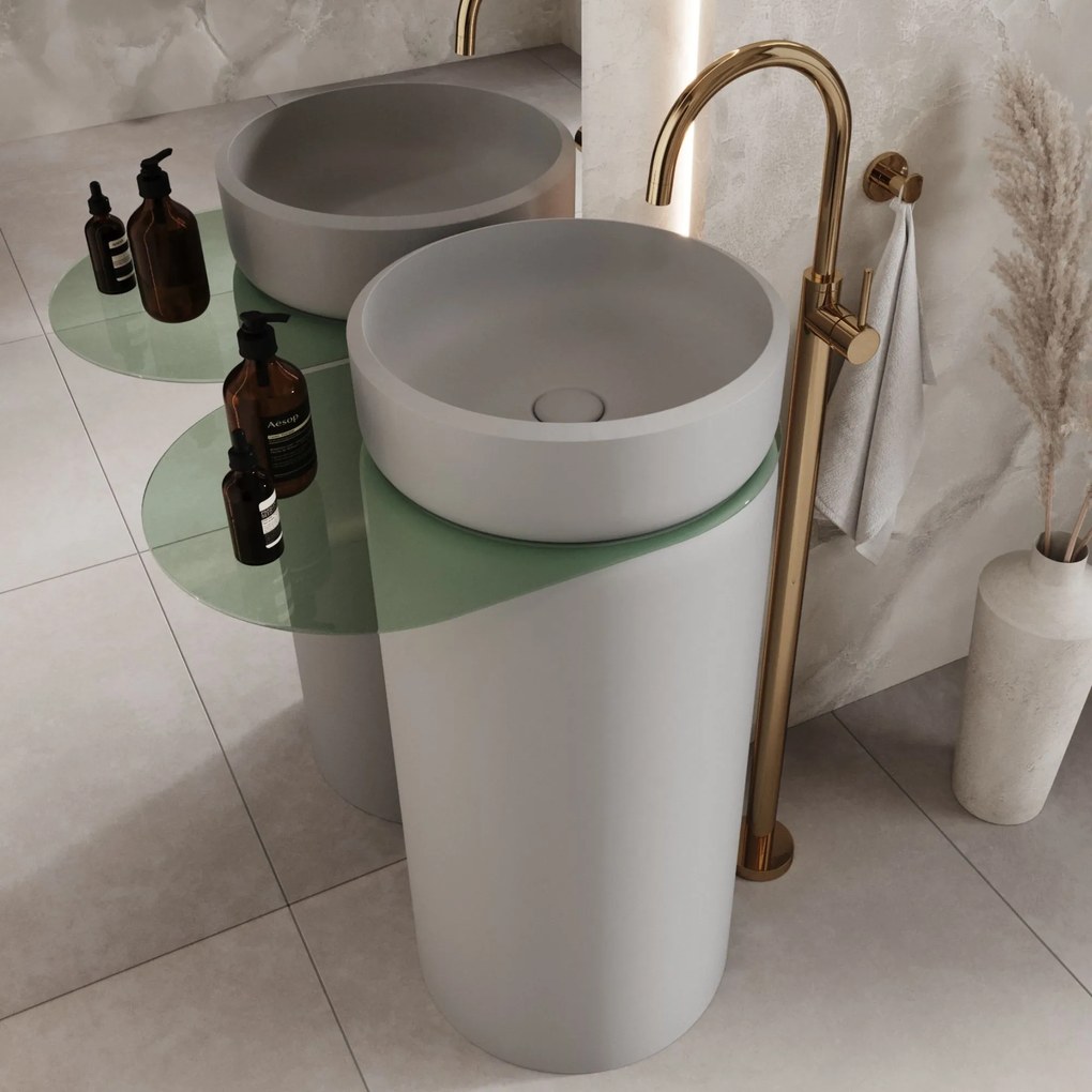Umywalka z konglomeratu wolnostojąca okrągła z półką szklaną 85 x 40 cm RONA bez przelewu | Różne kolory półki : Kolor szkła - Zielony, Kolor umywalki RONA - Szary matowy, Podłączenie syfonu - Do podłogi, Półka - Szklana