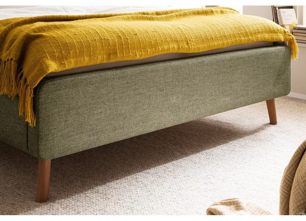 Zielone tapicerowane łóżko dwuosobowe ze schowkiem ze stelażem 160x200 cm Lotte – Meise Möbel