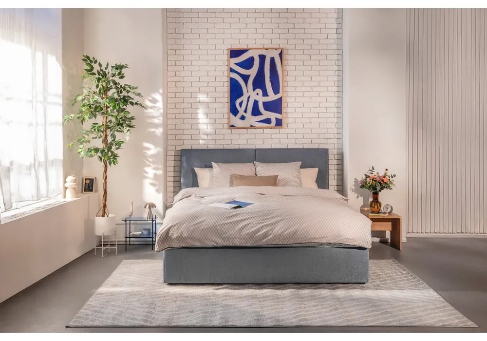 Niebieskie tapicerowane łóżko dwuosobowe ze schowkiem z materacem i stelażem 180x200 cm Thessa Bold – Bonami Selection