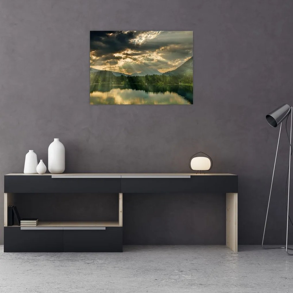 Obraz na szkle jeziora, przez które prześwieca słońce (70x50 cm)