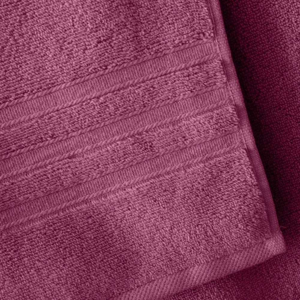 Ciemnoróżowy bawełniany ręcznik kąpielowy frotte 70x120 cm Zero Twist – Catherine Lansfield