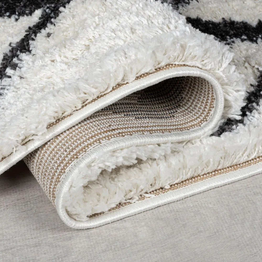 Dywan w kolorze kości słoniowej 80x150 cm Souq Lines – Flair Rugs