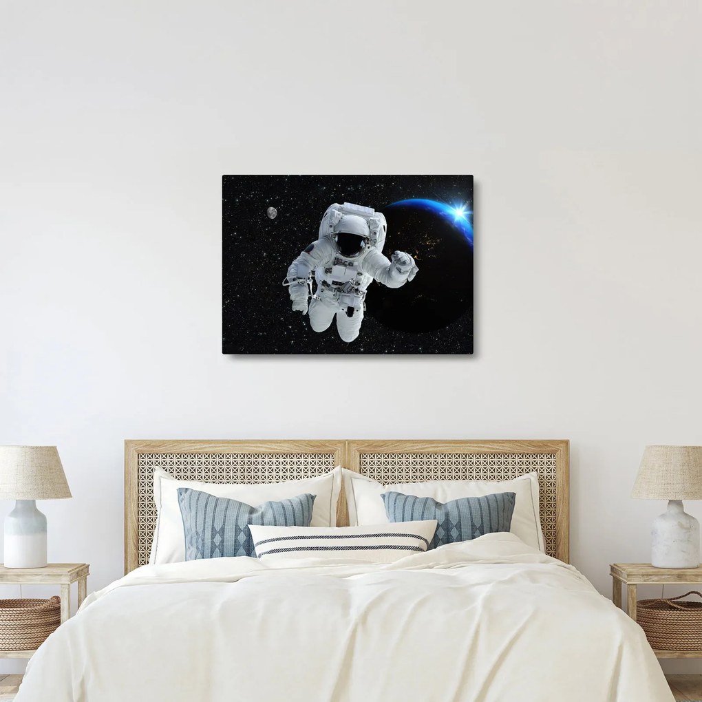 Obraz - Astronauta w kosmosie (70x50 cm)