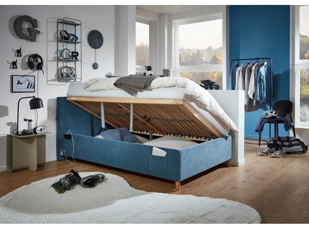 Niebieskie tapicerowane łóżko dziecięce ze schowkiem ze stelażem 90x200 cm Cool – Meise Möbel