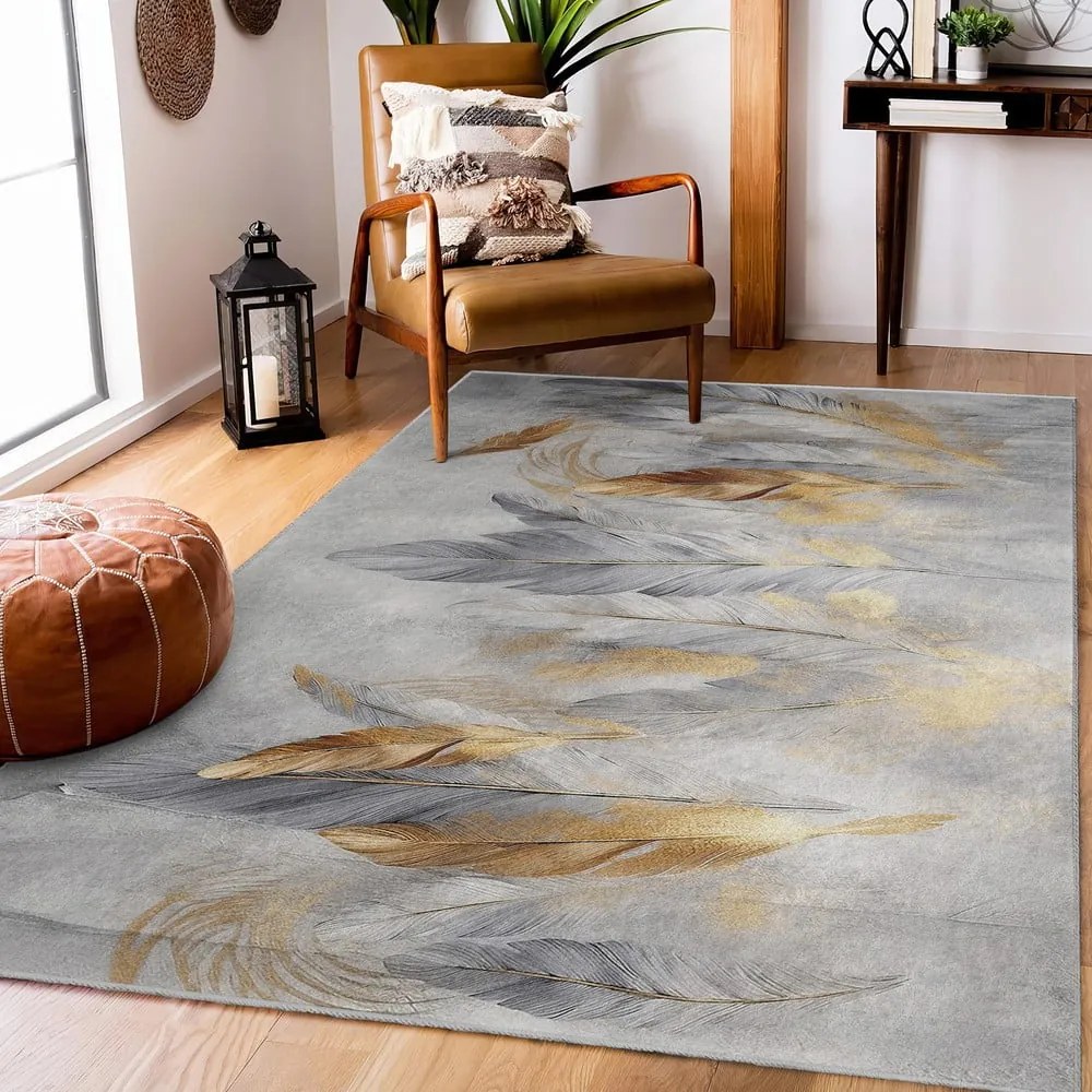 Dywan w szaro-złotym kolorze odpowiedni do prania 120x180 cm Golden Feathers – Mila Home