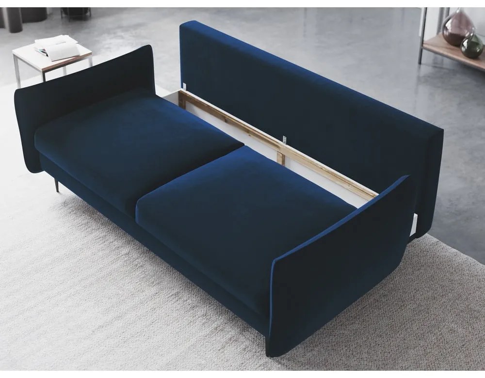 Ciemnoniebieska sofa rozkładana ze schowkiem Cosmopolitan Design Vermont