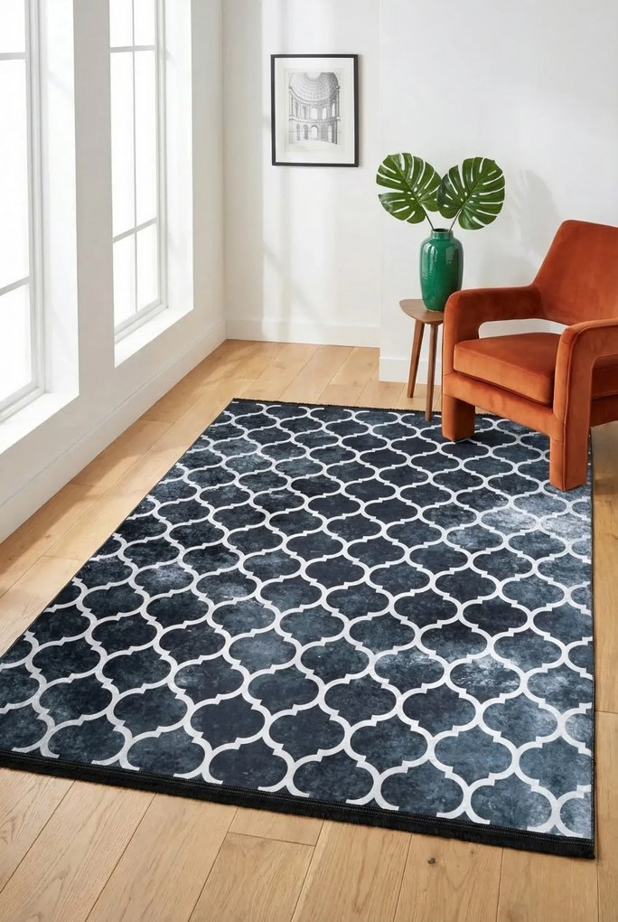 Czarny dywan glamour z geometrycznym wzorem i frędzlami R6-W80