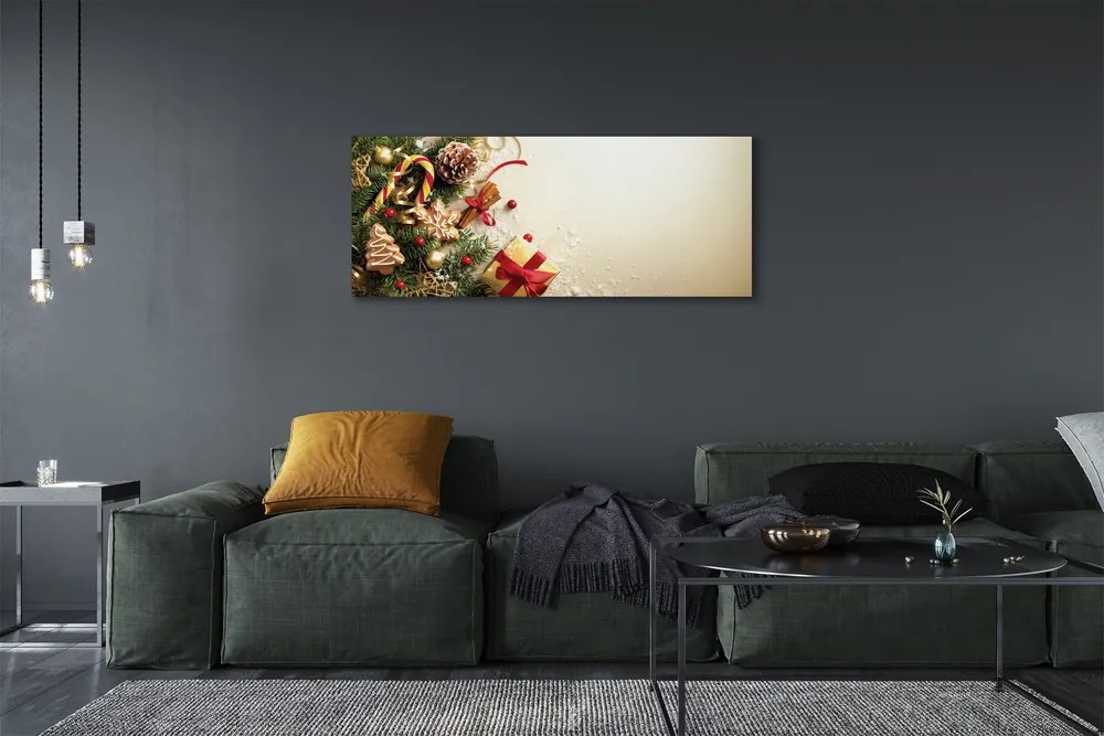 Obraz na płótnie Świąteczny Stół: Gałązki, Prezenty, Szyszki i Pierniki