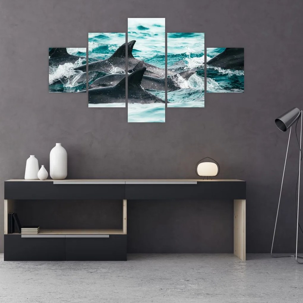 Obraz - Delfiny w oceanie (125x70 cm)