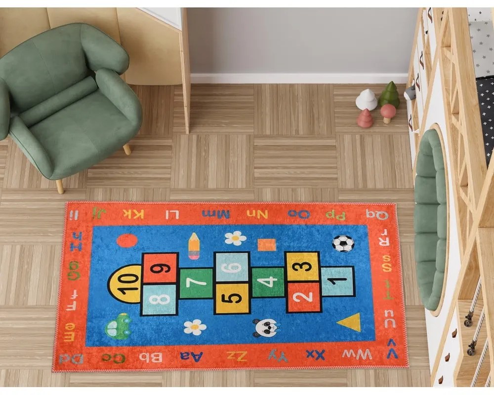 Pomarańczowy dziecięcy dywan do zabawy odpowiedni do prania 80x120 cm Hopscotch Orange – Vitaus