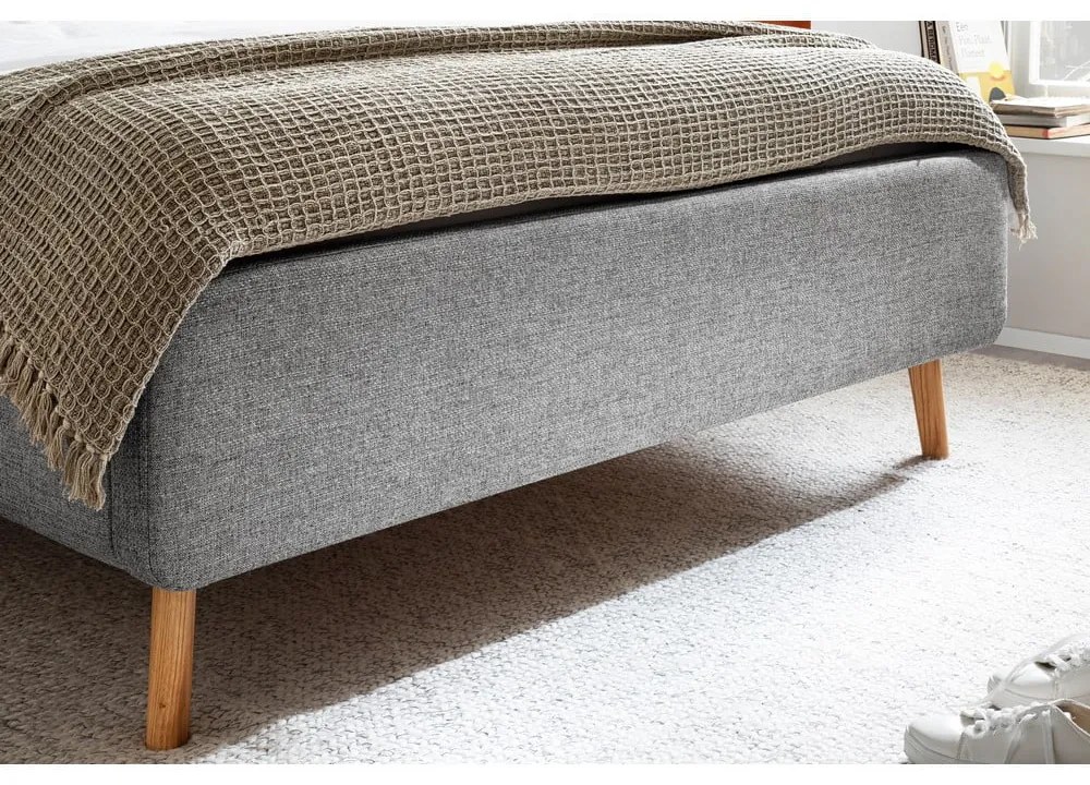 Szare tapicerowane łóżko dwuosobowe ze schowkiem ze stelażem 180x200 cm Lotte – Meise Möbel