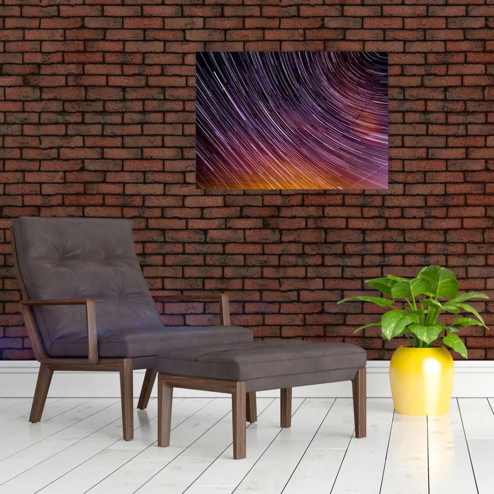 Obraz na szkle - rozmyte gwiazdy na niebie (70x50 cm)