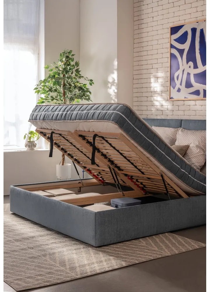 Niebieskie tapicerowane łóżko dwuosobowe ze schowkiem z materacem i stelażem 180x200 cm Thessa Bold Line – Bonami Selection