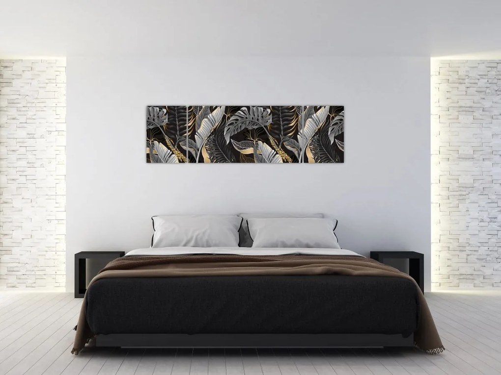 Obraz - Tropikalne liście w kolorze czarno - złotym (170x50 cm)