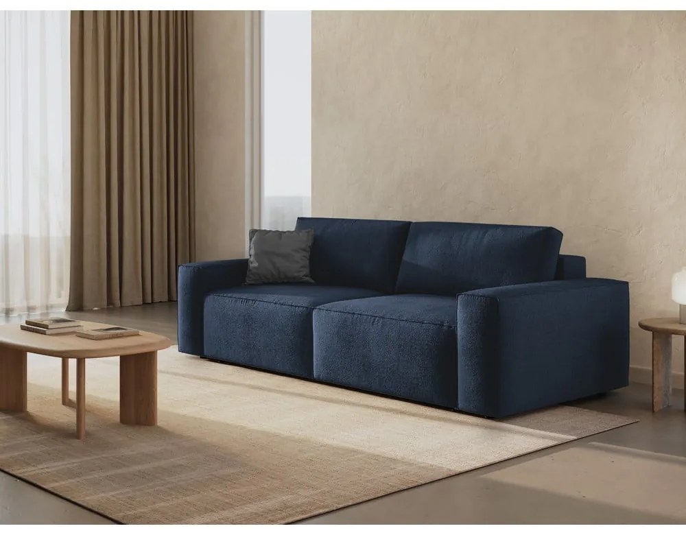 Ciemnoniebieska rozkładana sofa z materiału bouclé 247 cm Jodie – Micadoni Home