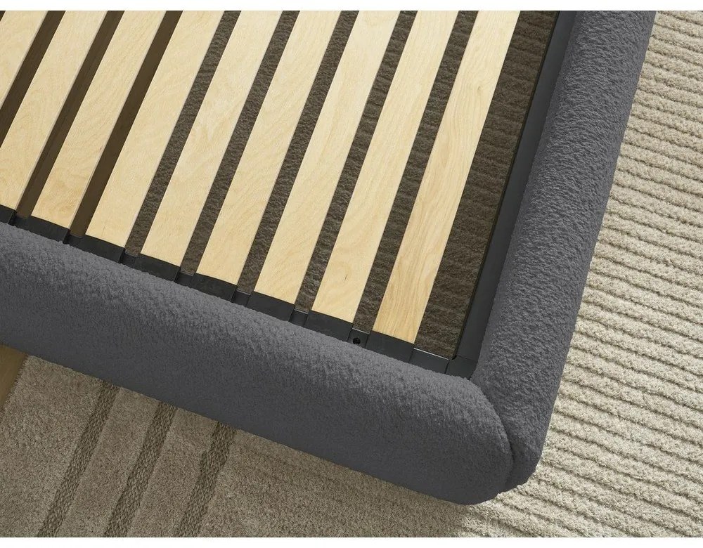 Ciemnoszare tapicerowane łóżko dwuosobowe bez zagłówka ze schowkiem i stelażem 180x200 cm Inera – Bobochic Paris