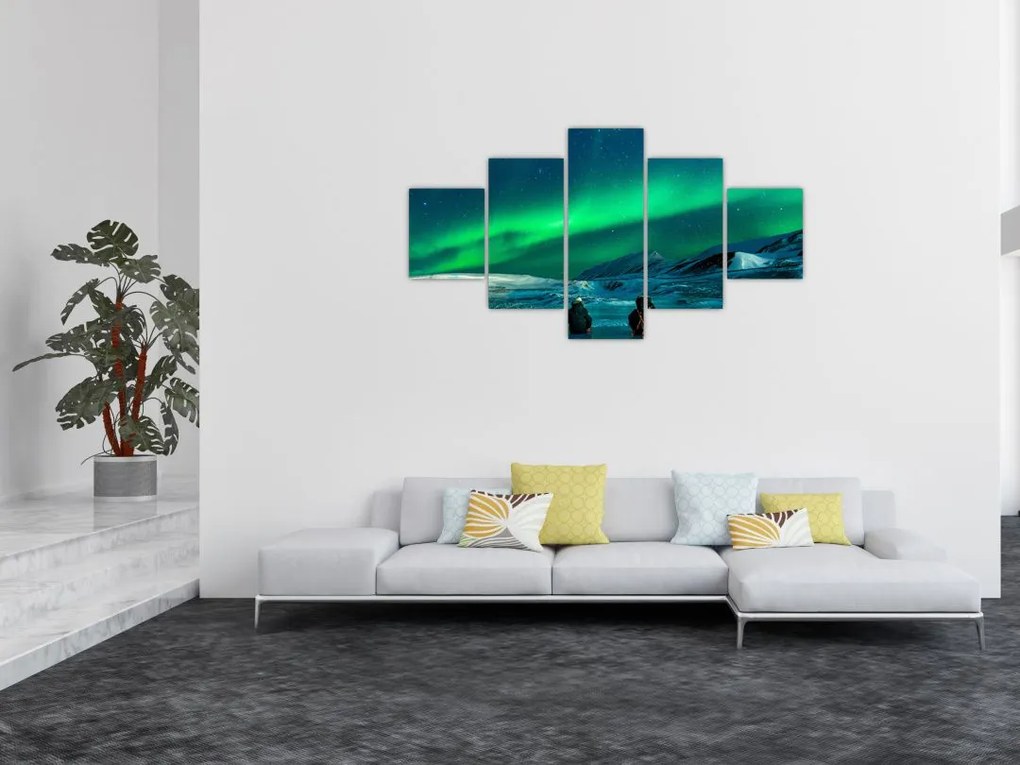 Obraz ludzi w pobliżu zorzy polarnej (125x70 cm)