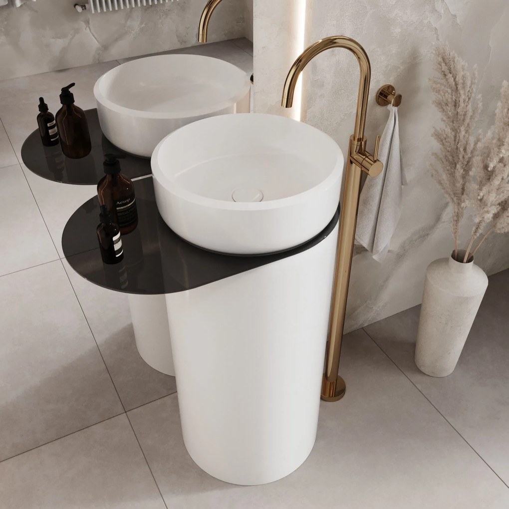 Umywalka z konglomeratu wolnostojąca okrągła z półką szklaną 85 x 40 cm RONA bez przelewu | Różne kolory półki : Kolor szkła - Czarny, Kolor umywalki RONA - Biały matowy, Podłączenie syfonu - Do ściany, Półka - Szklana