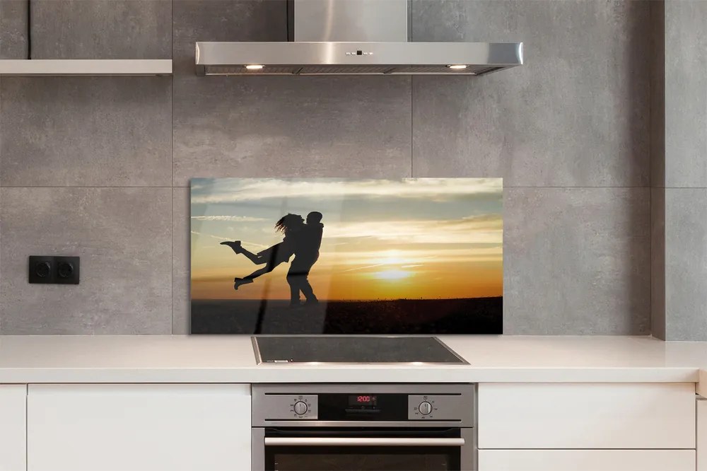 Panel szklany do Kuchni Ludzie na tle Wieczornych Chmur