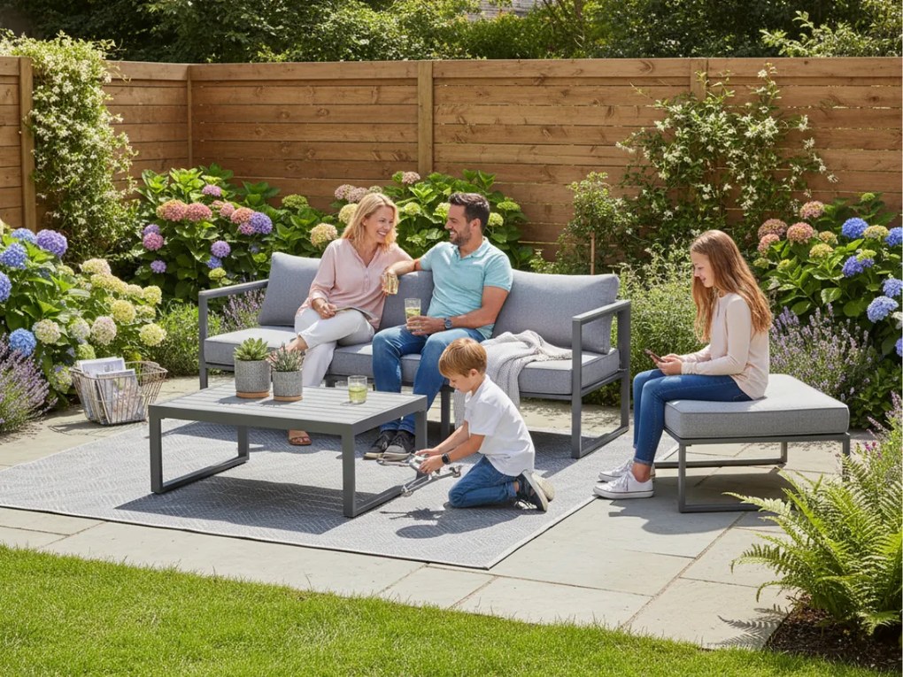 Zestaw mebli wypoczynkowych ( 3 - osobowa sofa, pufa +stolik) MOSTRARE szare aluminium, szare poduchy