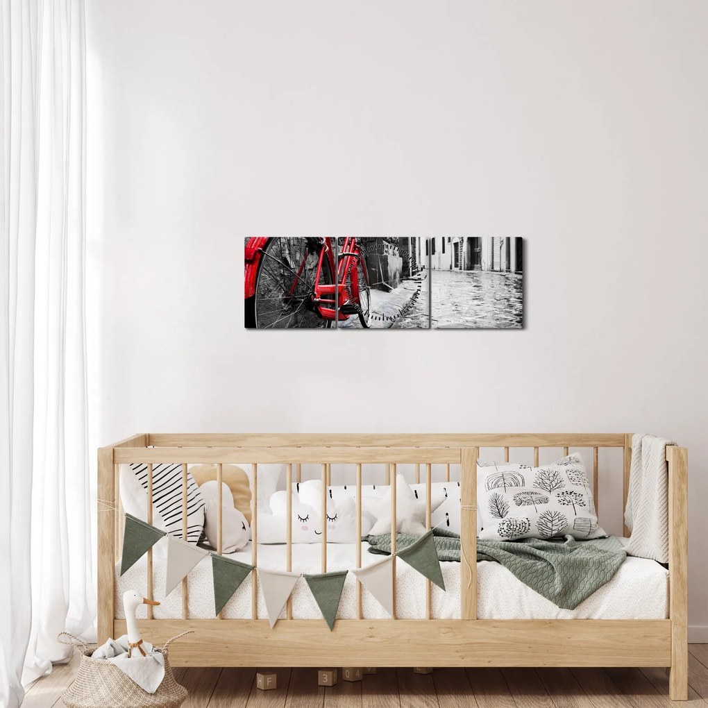 Obraz czerwonego roweru na brukowanej uliczce (z zegarem) (90x30 cm)
