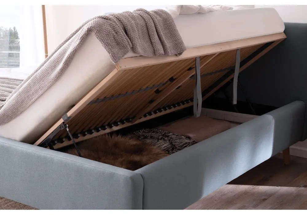 Szaroniebieskie tapicerowane łóżko dwuosobowe ze schowkiem ze stelażem 160x200 cm Mattis – Meise Möbel