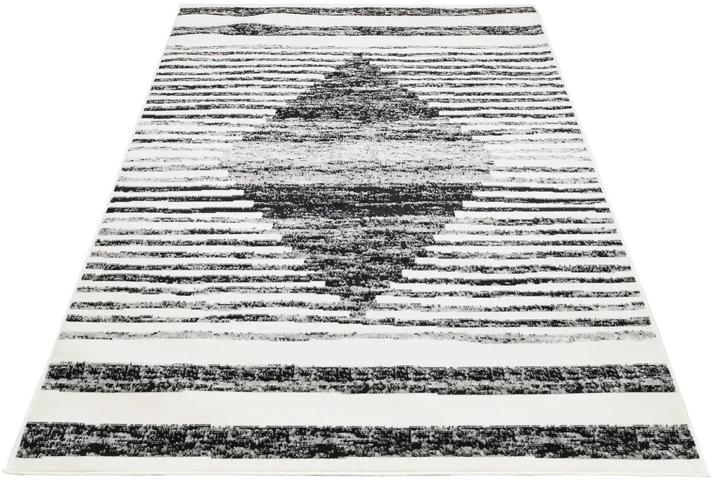 Elegancki czarno - biały dywan w nowoczesny stylu H4-L64