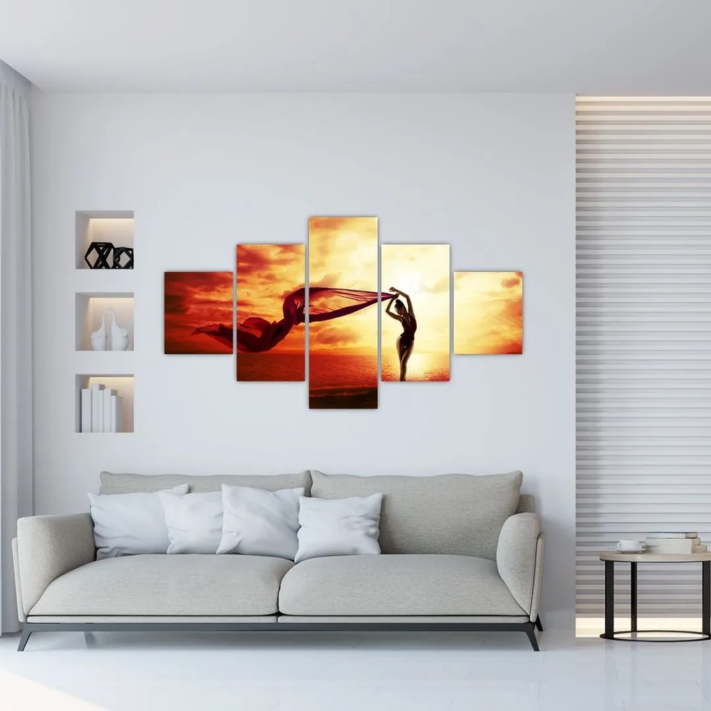 Obraz - Sylwetka kobiety o zachodzie słońca (125x70 cm)