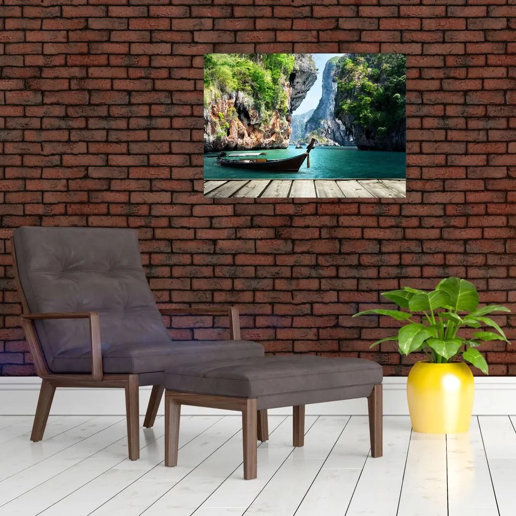 Obraz na szkle długiej łodzi na plaży (70x50 cm)