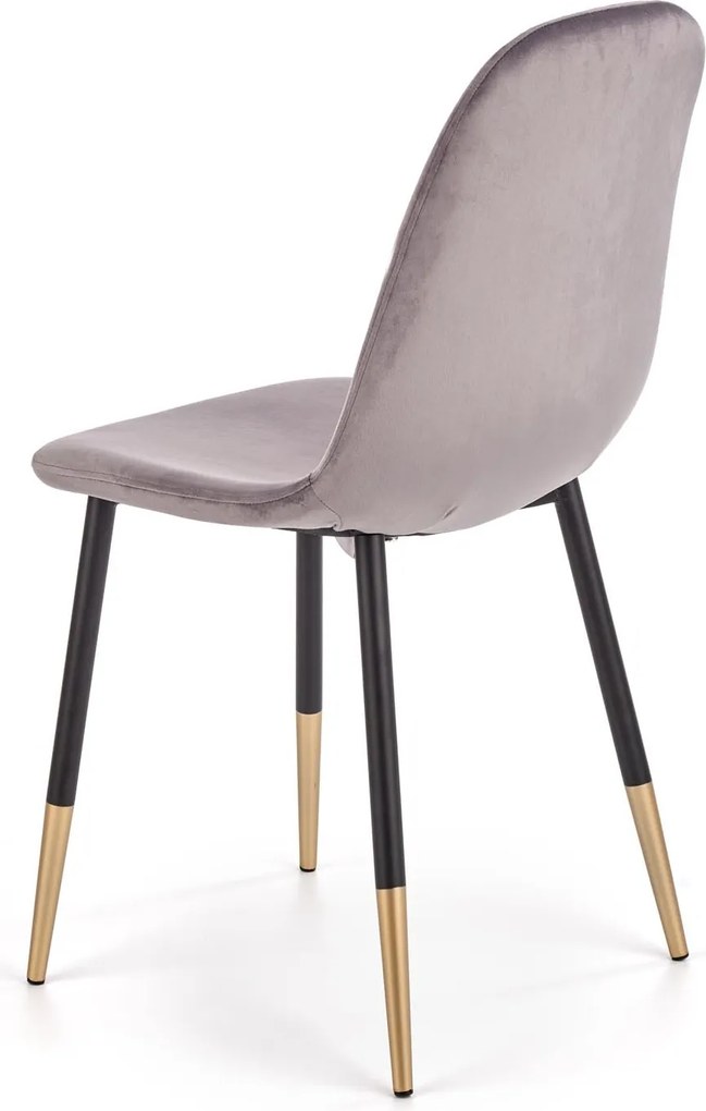 Tapicerowane krzesło z elementami w kolorze złota K379