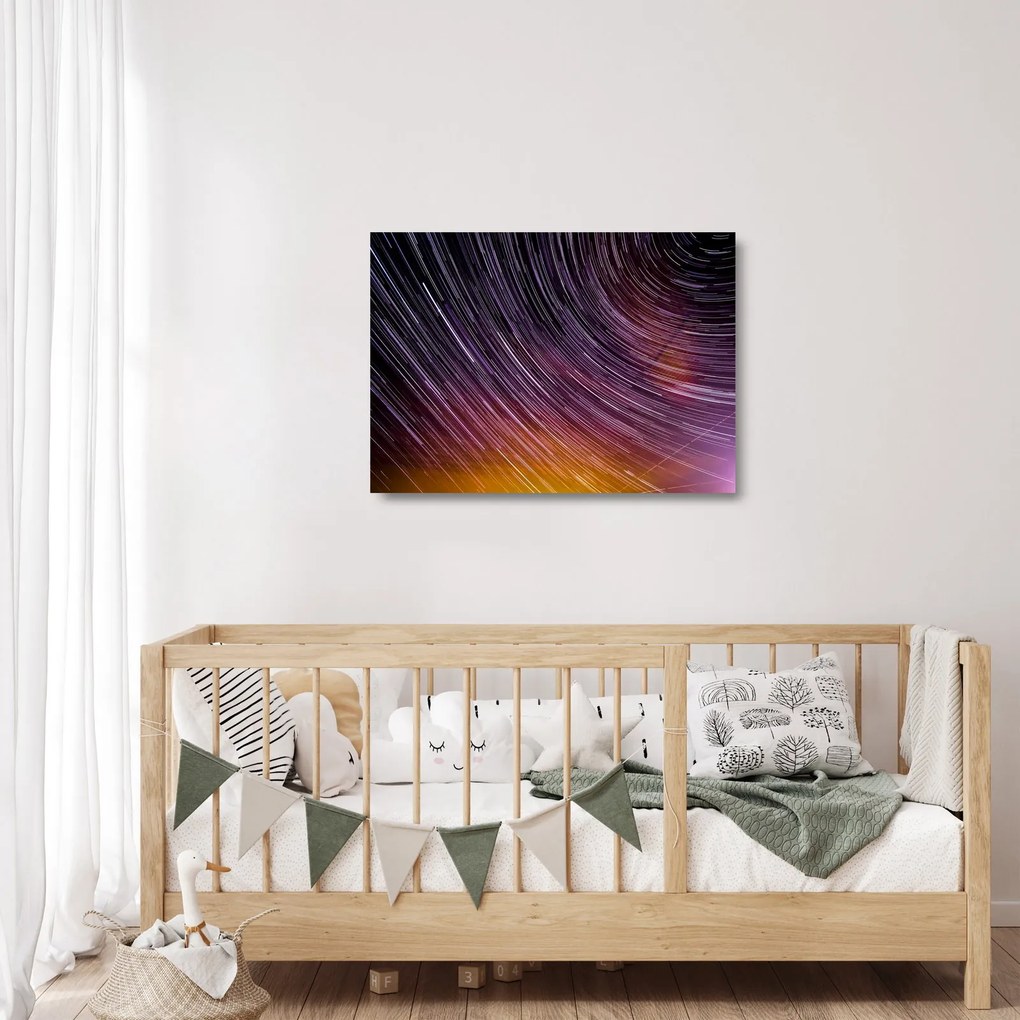 Obraz na szkle - rozmyte gwiazdy na niebie (70x50 cm)
