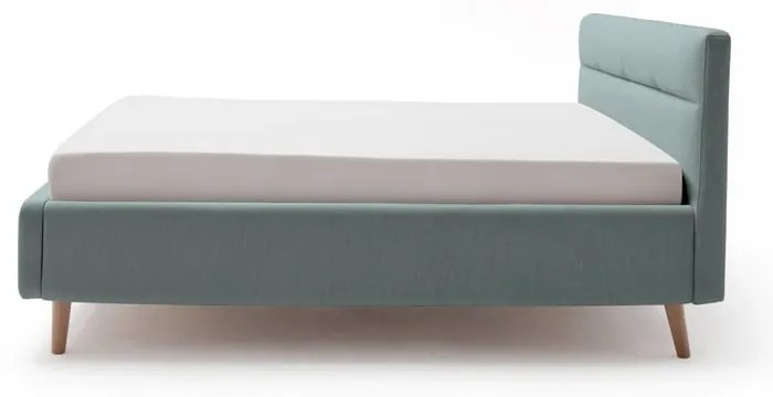 Jasnoniebieske tapicerowane łóżko dwuosobowe ze schowkiem i stelażem 180x200 cm Lotte – Meise Möbel