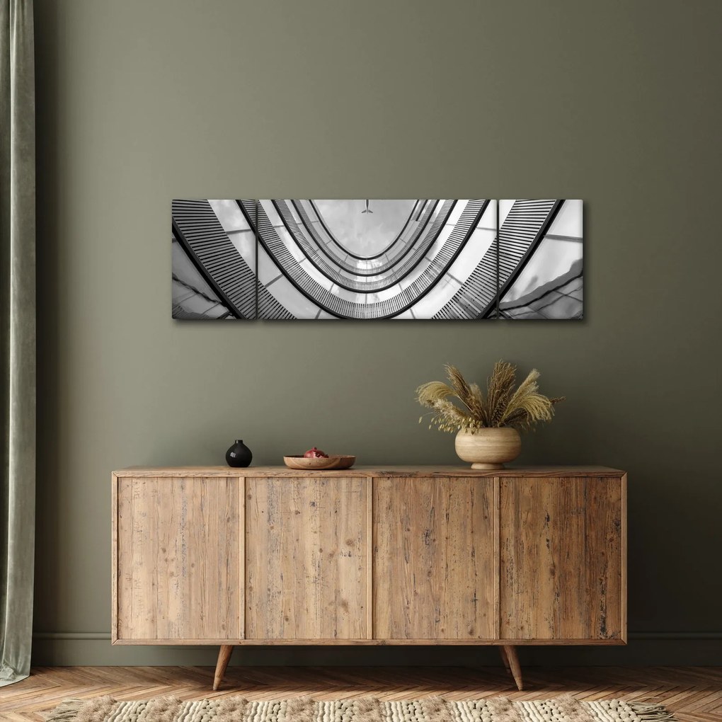 Obraz - Samolot nad budynkiem (170x50 cm)