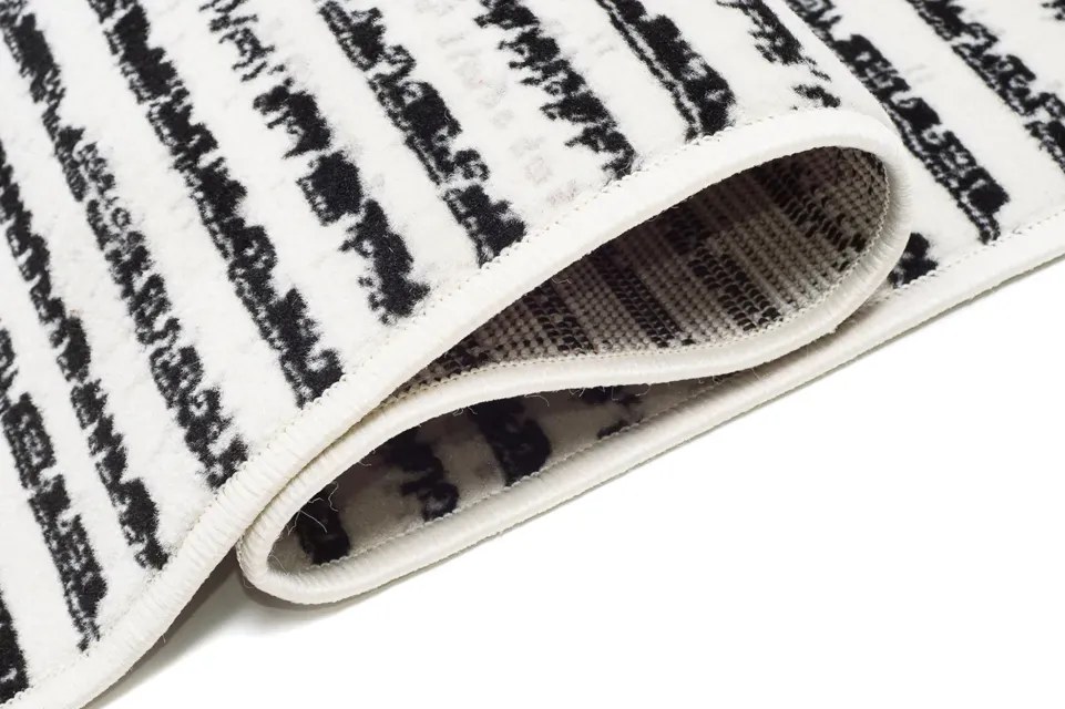 Prostokątny kremowy dywan w nowoczesny wzór C3-D74